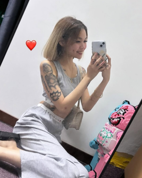 Young woman taking a selfie.