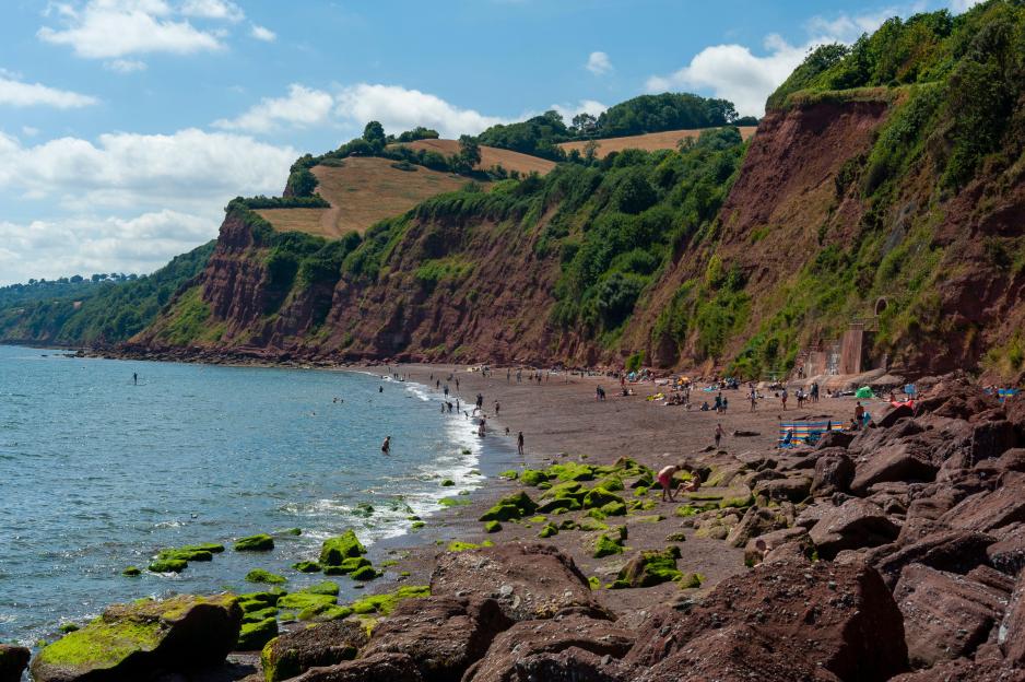 Ness Cove Beach in Teignmouth, Devon, UK, accessed via Smugglers Tunnel.
