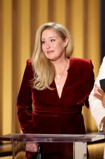 Christina Applegate speaking onstage at the 75th Primetime Emmy Awards.