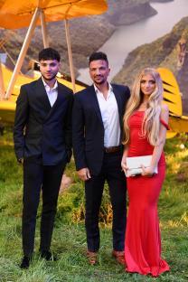 Junior, Peter, and Princess Andre at a film premiere.