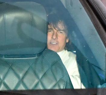 Tom Cruise in a car.