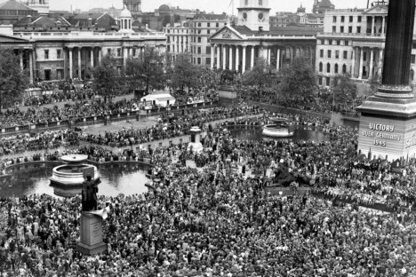 Black and white photo of a massive crowd celebrating Victory over Germany in 1945.