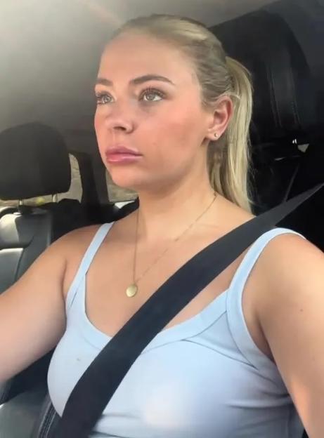 Woman driving a car.