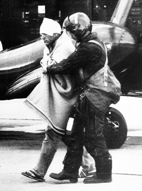 Piper Alpha oil rig disaster survivor being rescued.