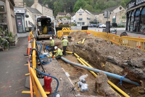 Workers repairing a damaged gas main in Nailsworth, Gloucestershire.