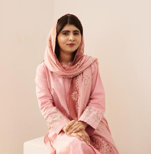 Malala Yousafzai in a pink outfit.