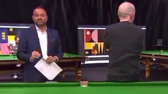 BBC presenter and snooker legend Steve Davis slams cue down and turns his back on camera as trick shot goes wrong
