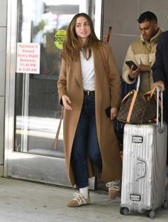 Ana de Armas arriving at an airport.