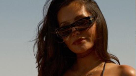 Arsenal star Ben White’s wife stuns in bikini as she shows off baby bump on boat and leaves fellow Wags amazed