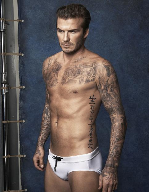 David Beckham in white swimwear from his H&M line.