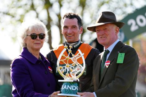 Jockey Patrick Mullins with his mother and father after a race win.
