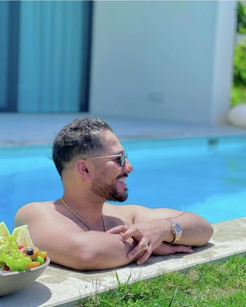 Man relaxing in a pool.