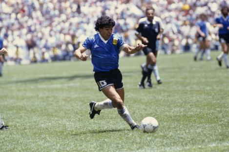 Diego Maradona playing soccer during the 1986 FIFA World Cup quarterfinal match against England.