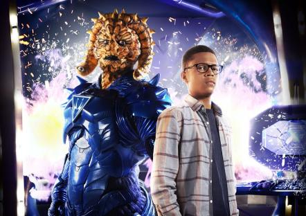 Benny Sherwood and an alien in blue armor from Wizards vs Aliens.