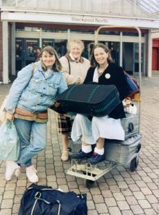 Three women with luggage at Blackpool North train station.