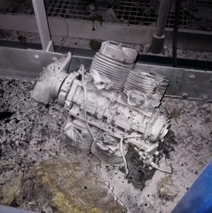 Damage to a vehicle engine at Chernobyl after a drone attack.