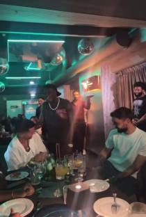 Bruno Fernandes and Joao Cancelo at a dinner party.