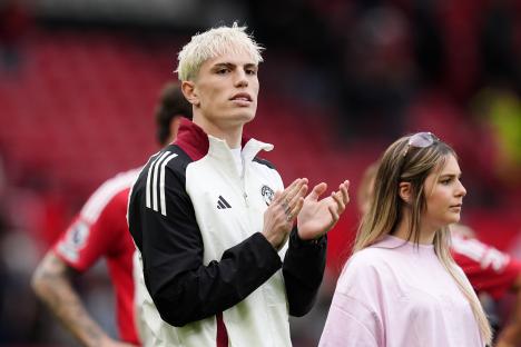 Alejandro Garnacho of Manchester United applauding fans.
