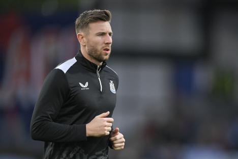 Paul Dummett of Newcastle United warming up before a match.