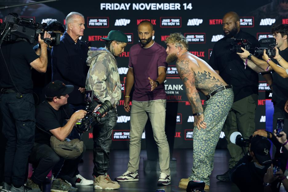 Gervonta 'Tank' Davis and Jake Paul face off during a press conference.