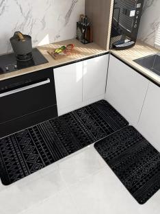 Black and white patterned kitchen floor mats.