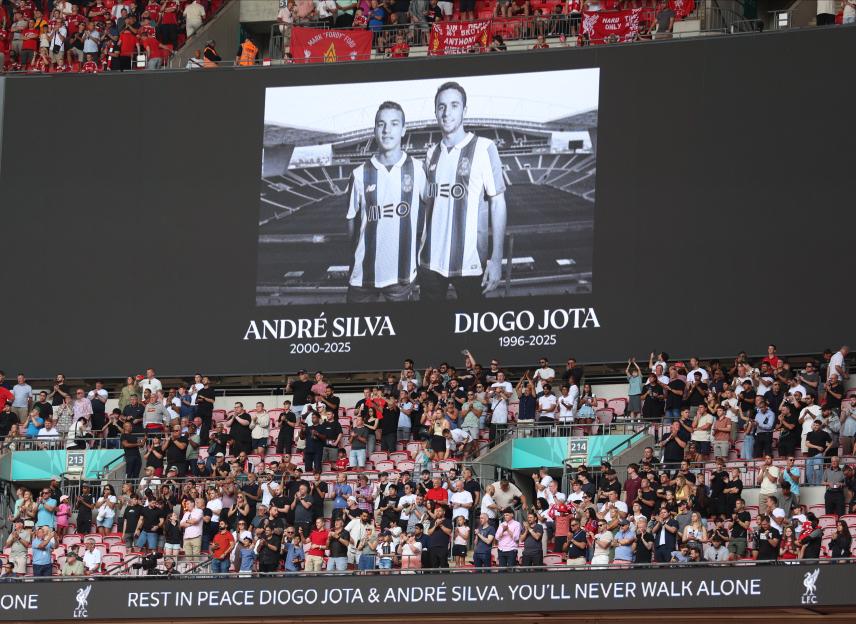 Stadium scoreboard tribute to Andre Silva and Diogo Jota.