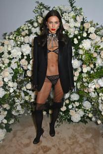 Irina Shayk in a sheer black dress at the Cannes Film Festival.