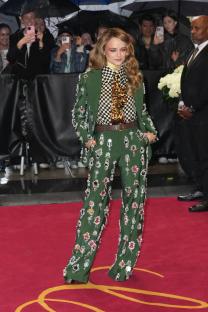 Joey King in a green embellished suit at the Met Gala.