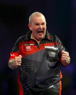 Phil Taylor celebrating at the World Darts Championship.
