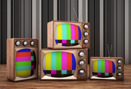 Illustration of three vintage televisions showing test patterns.
