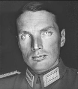 Black and white portrait of a man in military uniform.