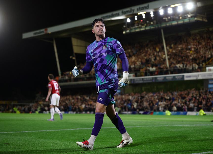Grimsby Town's Christy Pym during a penalty shootout.