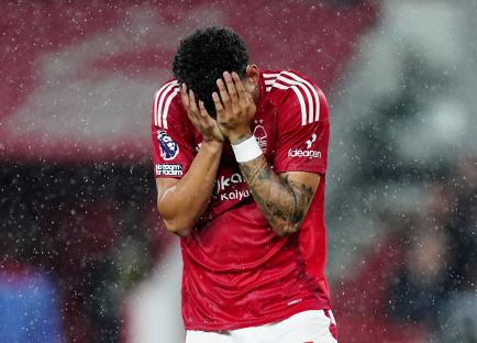 Morgan Gibbs-White of Nottingham Forest dejected on the pitch.