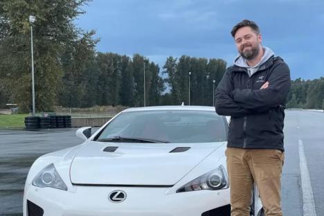An image collage containing 1 images, Image 1 shows Man standing in front of a white Lexus LFA