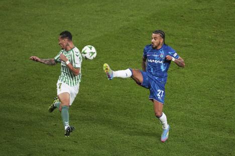 Chelsea's Malo Gusto challenges for the ball during a soccer match.