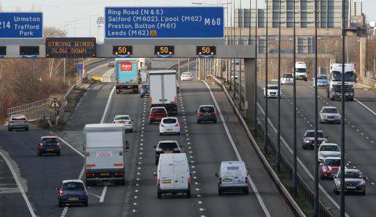 Traffic on the M60 motorway in Manchester, England.