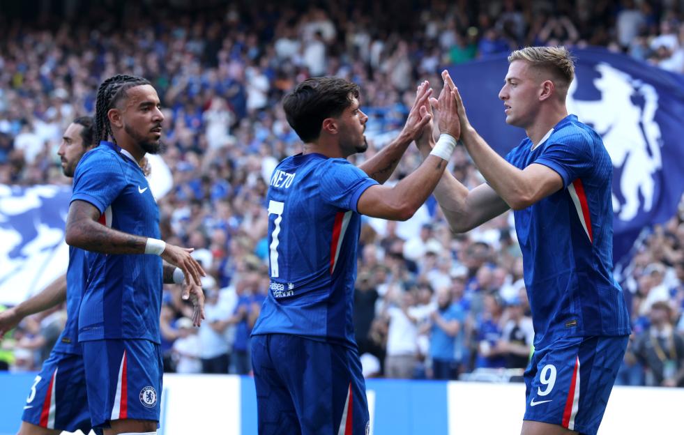 Liam Delap and Pedro Neto of Chelsea celebrating a goal.