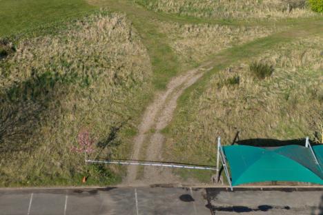 Woman fighting for life after being struck by van that veered onto golf course in police chase – sparking urgent manhunt