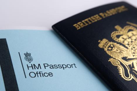 HM Passport Office letter and British passport.