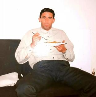 Photo of Stephen Gillen eating a meal.