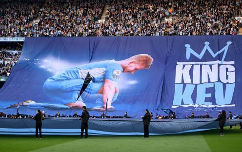 A large banner depicting Kevin De Bruyne with