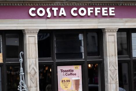 Three injured as car smashes through Costa Coffee window with air ambulance deployed