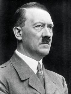 Black and white portrait photograph of Adolf Hitler.