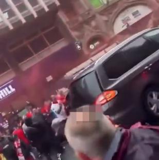 Aftermath of a car plowing into a Liverpool FC parade crowd.