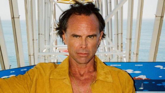 White Lotus star Walton Goggins reveals eye-catching bulge in skintight yellow speedo for Cultured photoshoot