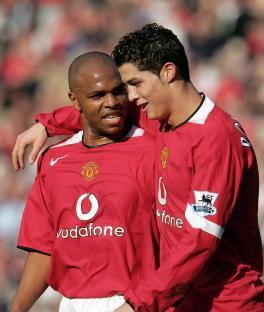 Cristiano Ronaldo and a teammate celebrating a goal.