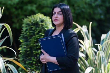 Shabana Mahmood, Lord Chancellor and Secretary of State for Justice, carrying a blue folder.