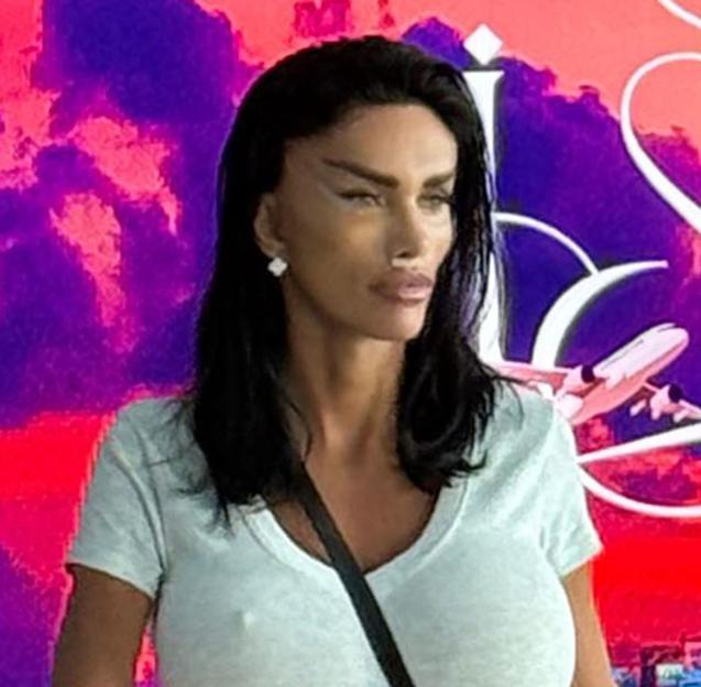 Katie Price at an airport after facial surgery.