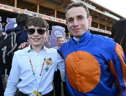 Del Mar Breeders Cup 1-November-2024 Juvenile Fillies Turf Lake Victoria winning jockey Ryan Moore and son Toby after win for trainer Aidan O'Brien. Photo Healy Racing / Racingfotos.com THIS IMAGE IS SOURCED FROM AND MUST BE BYLINED