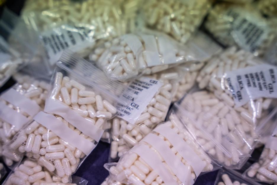 Seized pills in plastic bags.